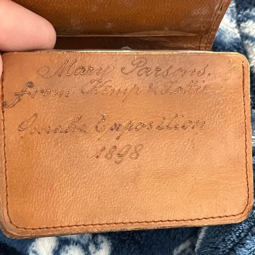 1898 Antique hand-tooled Leather billfold wallet featuring a floral pattern